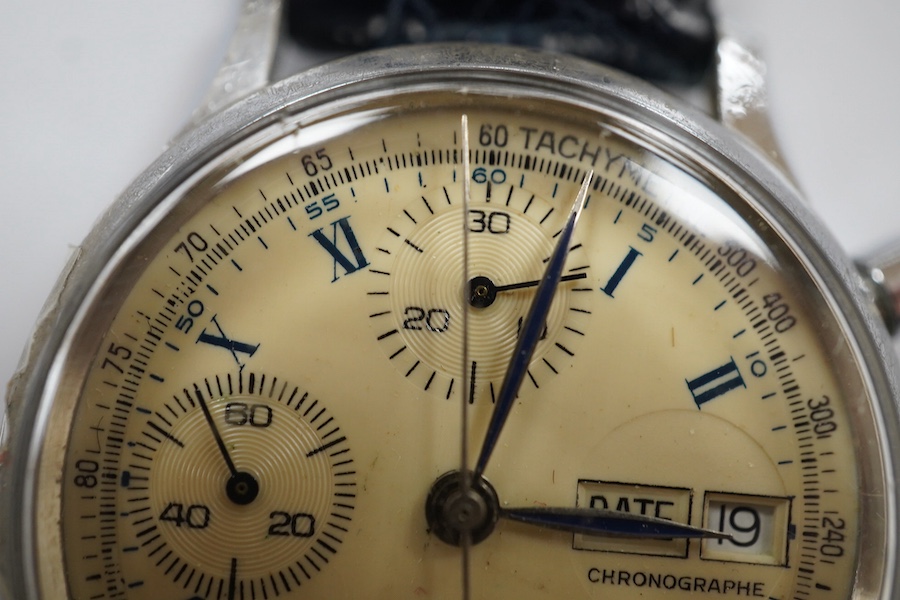 A gentleman's stainless steel calendar moonphase chronograph manual wind wrist watch, case diameter 36mm, on a later associated strap. Condition - poor to fair